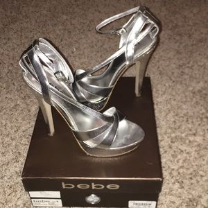 Bebe platform sandal heel. Silver. Size 9